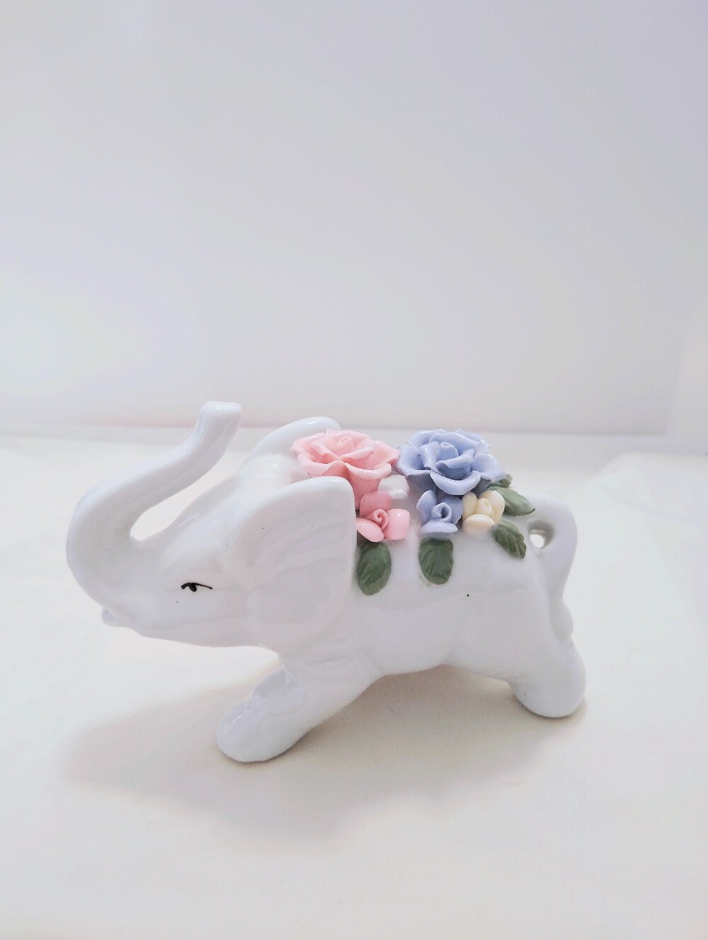 Vintage Ceramic White Elephant Figurine Adorned w/ Pink and Blue Flowers
